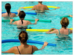 Women taking part in a water aerobics class
