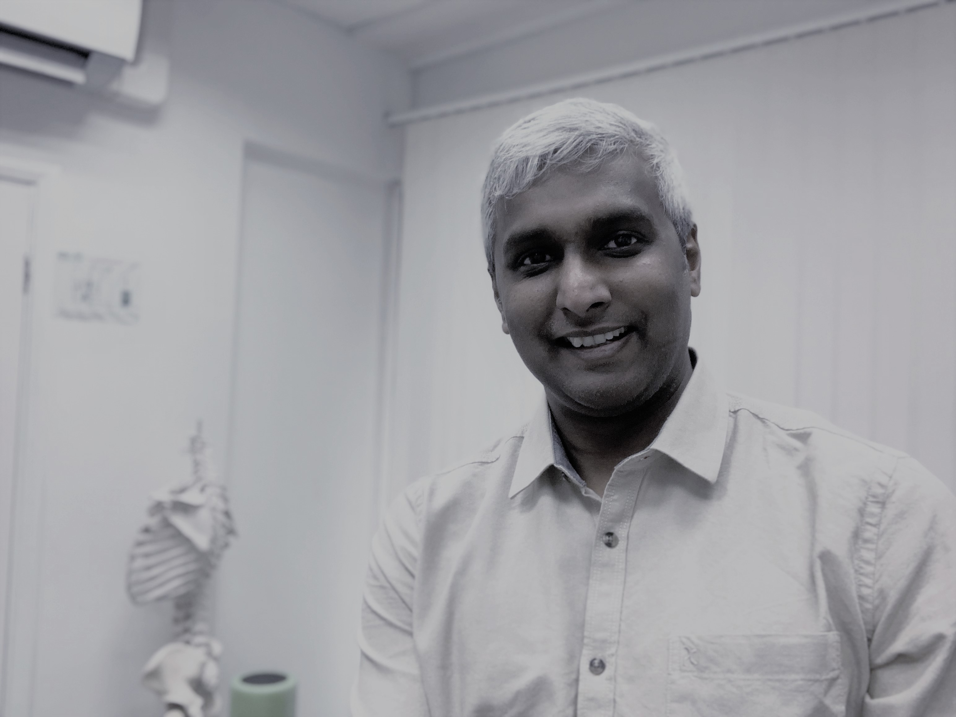 Close up portrait of Karthik.
